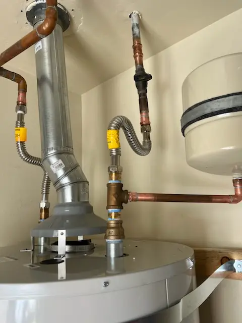 Water heater installation and plumbing repair in Roslin